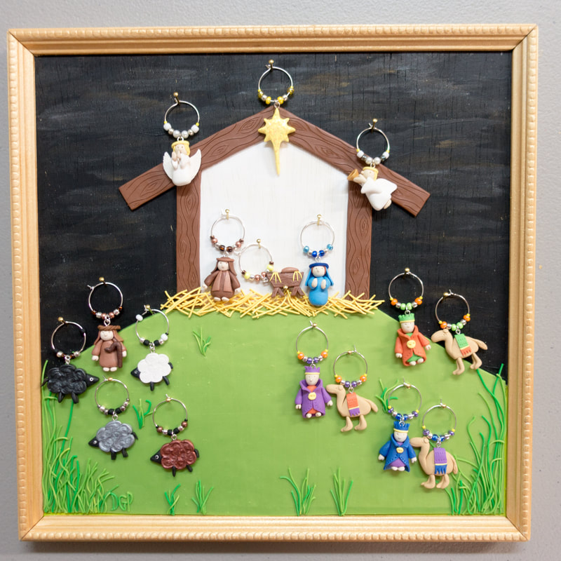 Nativity Wine Charm Picture - large  $200, includes 17 charms, a stand and a storage box. Made to order